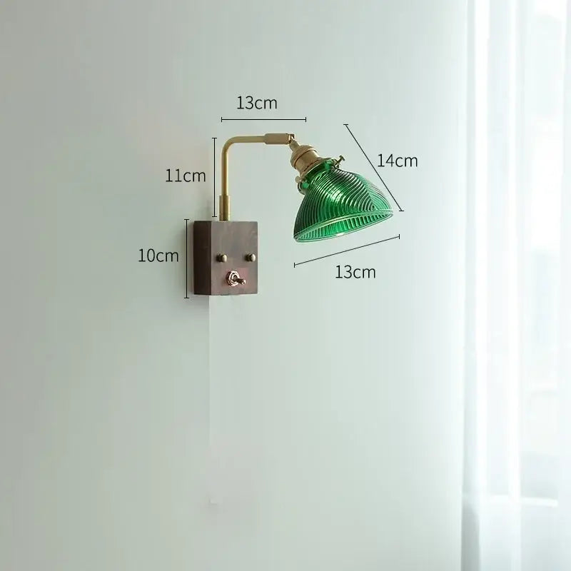 Modern brass and ribbed clear glass wall light with green glass shade and dark metal base for bedroom decorbites clear glass
