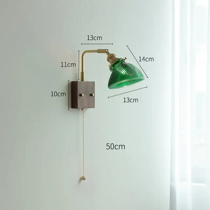 Modern brass wall light with green ribbed clear glass lampshade on dark wood base by decorbites clear glass
