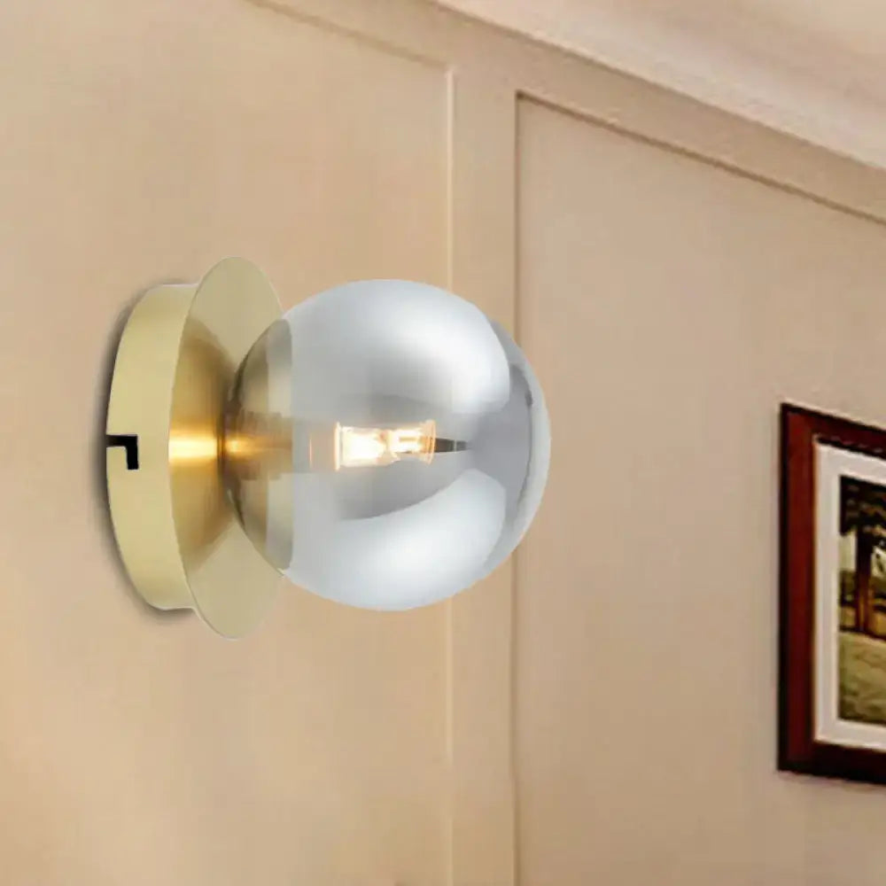 Modern brass and smoky glass shade wall lamp with brushed brass base and chrome sphere light fixture for bedroom