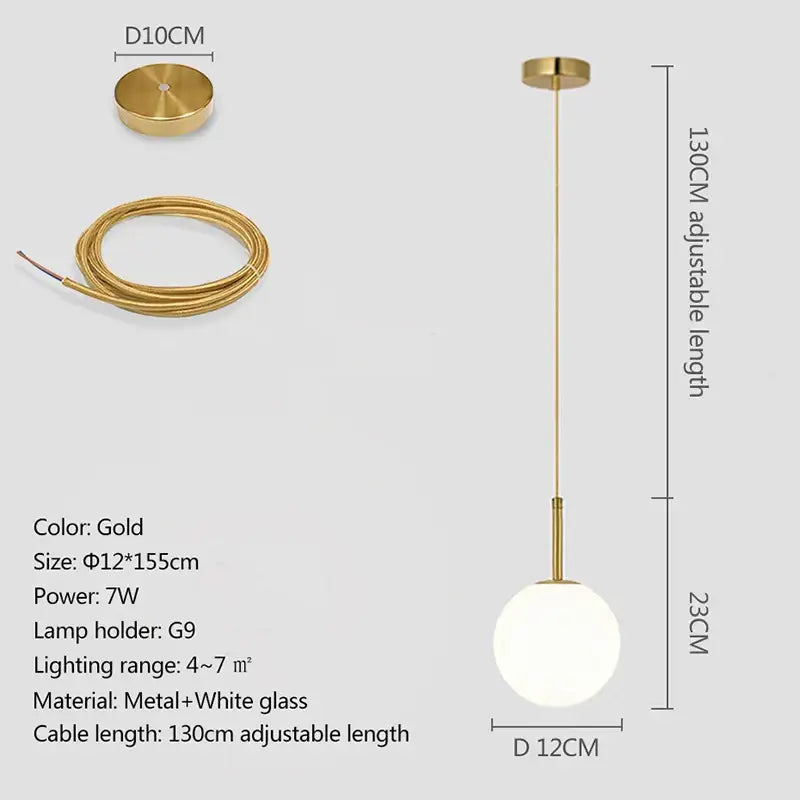 Modern brass pendant light with smoky gray glass globe and adjustable metal cable for dining room lighting