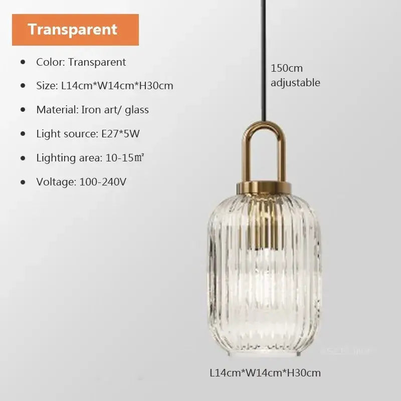 Modern brass and striped glass pendant light with transparent ribbed glass and brass fixture for dining room use