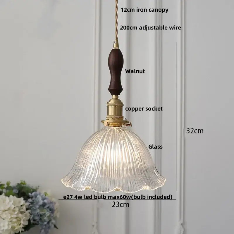 Modern pendant light with a knob switch featuring a delicate fluted glass shade and dark walnut wooden handle decorbites clear glass