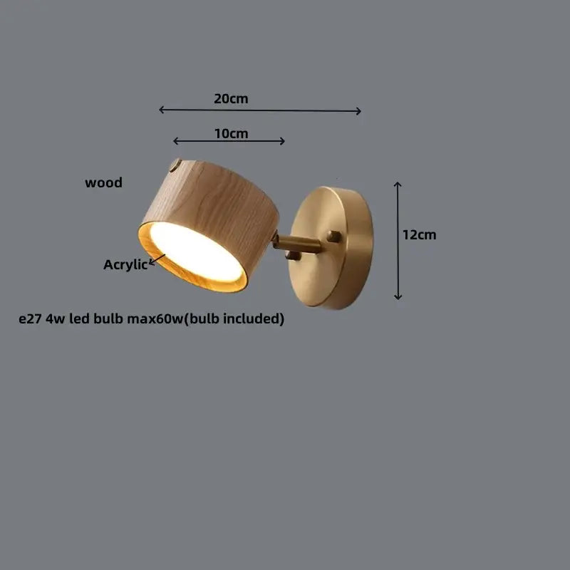 Modern brass and walnut led wall sconce with wood cylindrical shade and acrylic lens diffusing warm light for bedroom