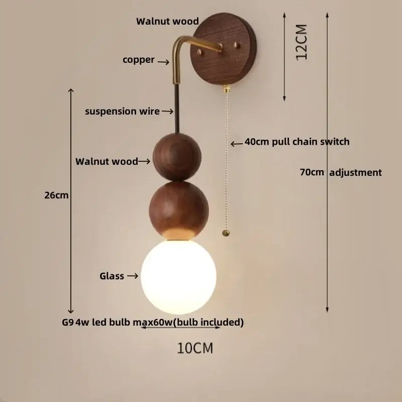 Modern brass and walnut wood wall sconce with walnut wood base copper arm and glowing glass globe for bedroom decorbites adjustable walnut