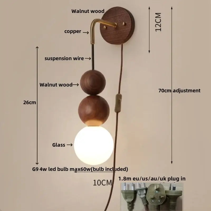 A modern wall sconce with walnut wood base, brass copper accent, and glass bulb for stylish bedroom decorbites adjustable walnut lighting