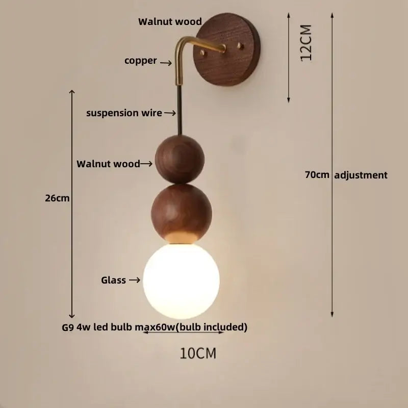 Modern brass and walnut wood wall sconce with a walnut wood circular base and frosted glass globe bulb for bedroom decorbites adjustable walnut