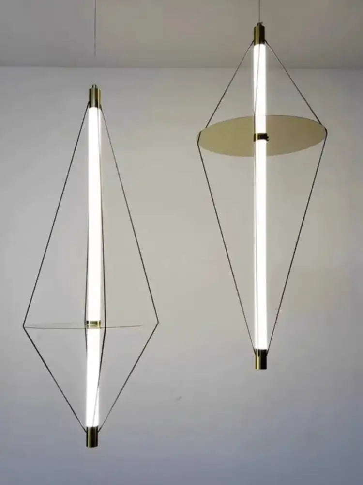 Modern brass and white led disc pendant light with sleek brass accents and black wire frame for stylish decorbites pendant light