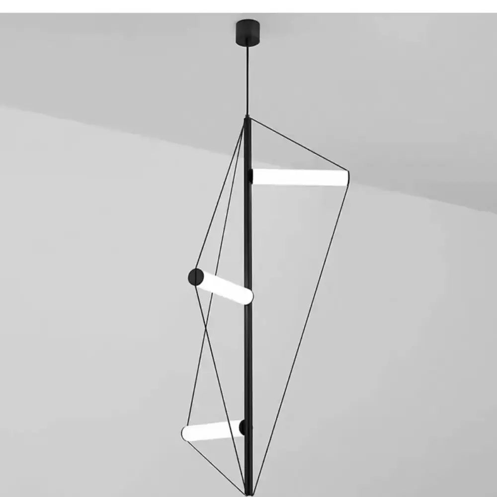 Modern brass and white led disc pendant light with black geometric design and three white cylindrical led tubes by decorbites pendant light