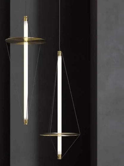 Modern brass and white led disc pendant light with slender glowing tubes for elegant bedroom decorbites disc pendant lighting