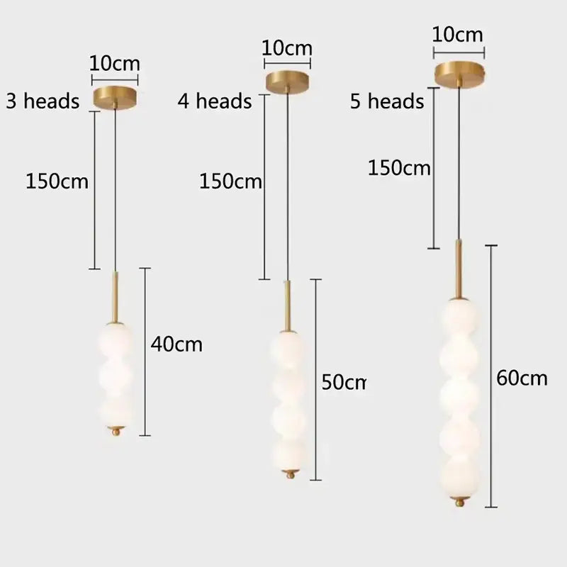 Modern brass and white pearl led pendant lights with brass metal frame and frosted glass globes for kitchen decorbites led white