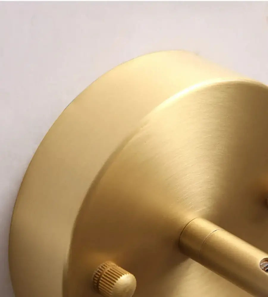 Modern brass and wood base wall sconce with a brass finish and adjustable arm for decorbites led wood spotlight decor