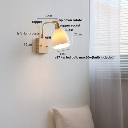 Modern brass and wood ceramic led wall sconce with warm copper finish, matte white glass shade, and adjustable rotation for directional lighting