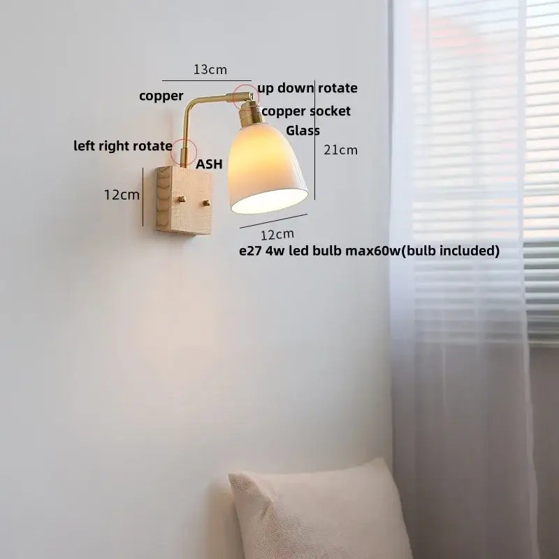 Modern brass and wood ceramic led wall sconce with warm copper finish, matte white glass shade, and adjustable rotation for directional lighting