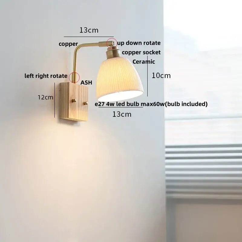 Modern brass and wood ceramic led wall sconce with warm-toned ceramic shade, copper arm, wooden base, and adjustable rotation