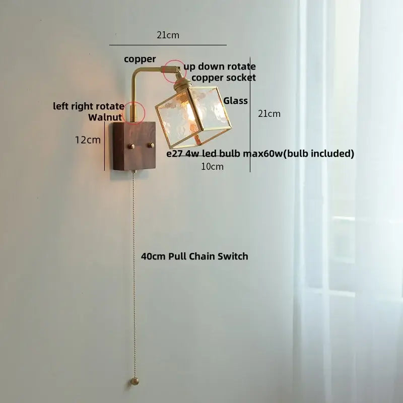 Modern brass and wood led wall lights with a copper and walnut wall sconce and a glass cube shade for bedroom use