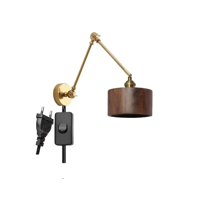 Modern brass and wood led wall sconce with adjustable brass finish dark wood shade and black power cord for bedroom use