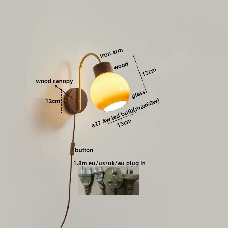 Modern brass and wood led wall sconce with warm-toned glass globe lamp and curved iron arm for decorbites led wall use