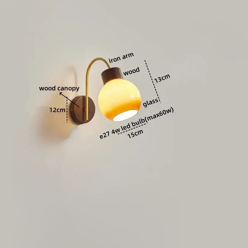 Modern brass and wood led wall sconce pull chain with warm-toned glass globe and dark wood canopy for bedroom decorbites led wall