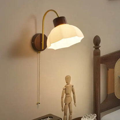 Modern brass and wood led wall sconce pull chain with warm-toned brass and cream glass for bedroom decorbites led wall use