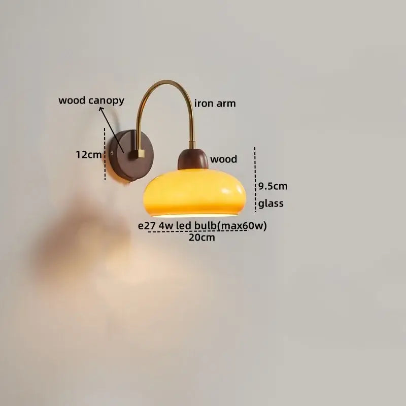 Modern brass and wood led wall sconce with yellow glass lamp and curved iron arm for bedroom decorbites led wall use