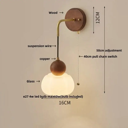 Modern brass and wood ribbed glass wall light with warm-toned glass globe and copper adjustable led accents for bedroom decorbites wall light