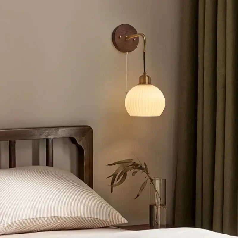 Modern brass and wood ribbed glass wall light with warm tones perfect for bedroom decorbites copper adjustable led use