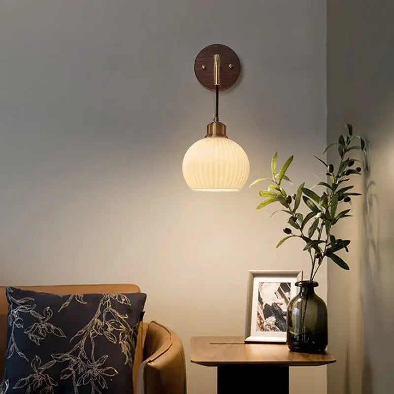Modern brass and wood ribbed glass wall light with warm-toned globe pendant for bedroom decorbites copper adjustable use