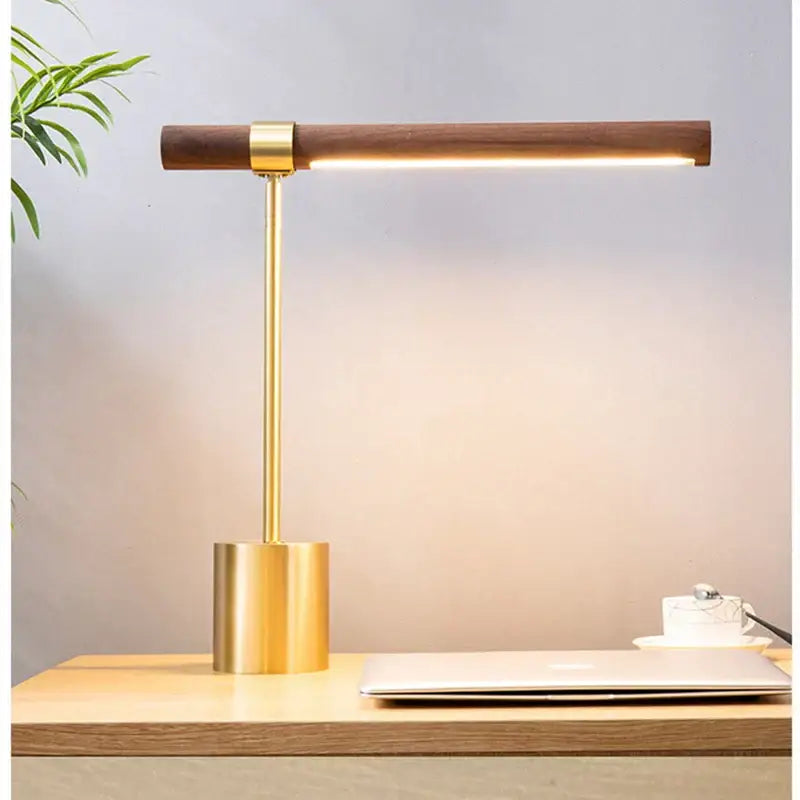 Modern brass and wood table lamp with sleek brass base gold stem and warm wood table lamp decorbites led wood design