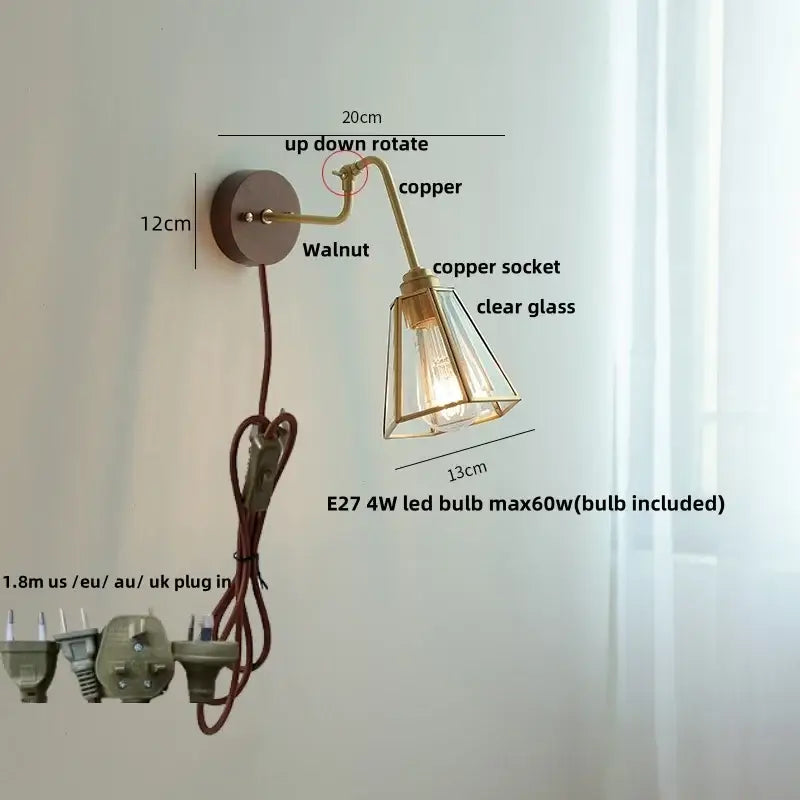 Modern brass and wood wall sconce with copper finish, walnut base, clear glass shade, adjustable arm, amber led decorbites copper glass