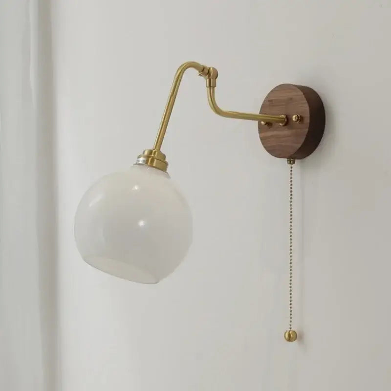 Modern brass and wood wall sconce with amber led and opaque white glass globe for bathroom decorbites copper glass