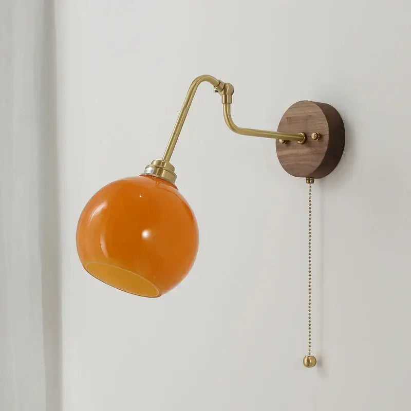 Modern brass and wood wall sconce with amber led orange spherical glass lamp for decorbites copper glass lighting