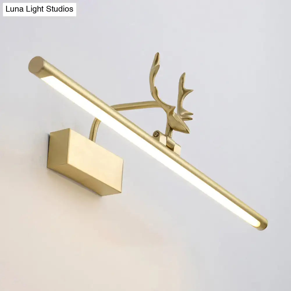 Modern brass antler led wall light in gold color designed for bathroom vanity with deer antler motif
