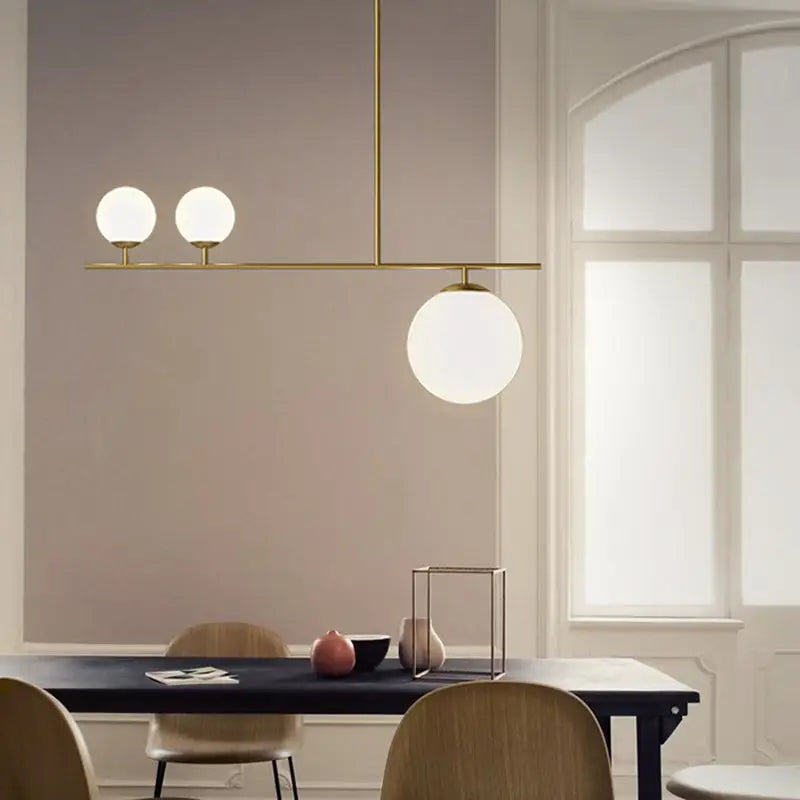 Modern brass ball pendant light with three frosted opal glass globe bulbs for dining room 220v-240v 110v-120v use
