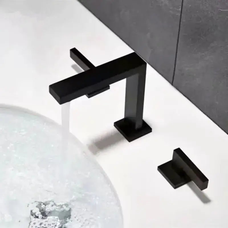Modern brass black basin faucet with angular matte black decorbites brass black design and matching square handle