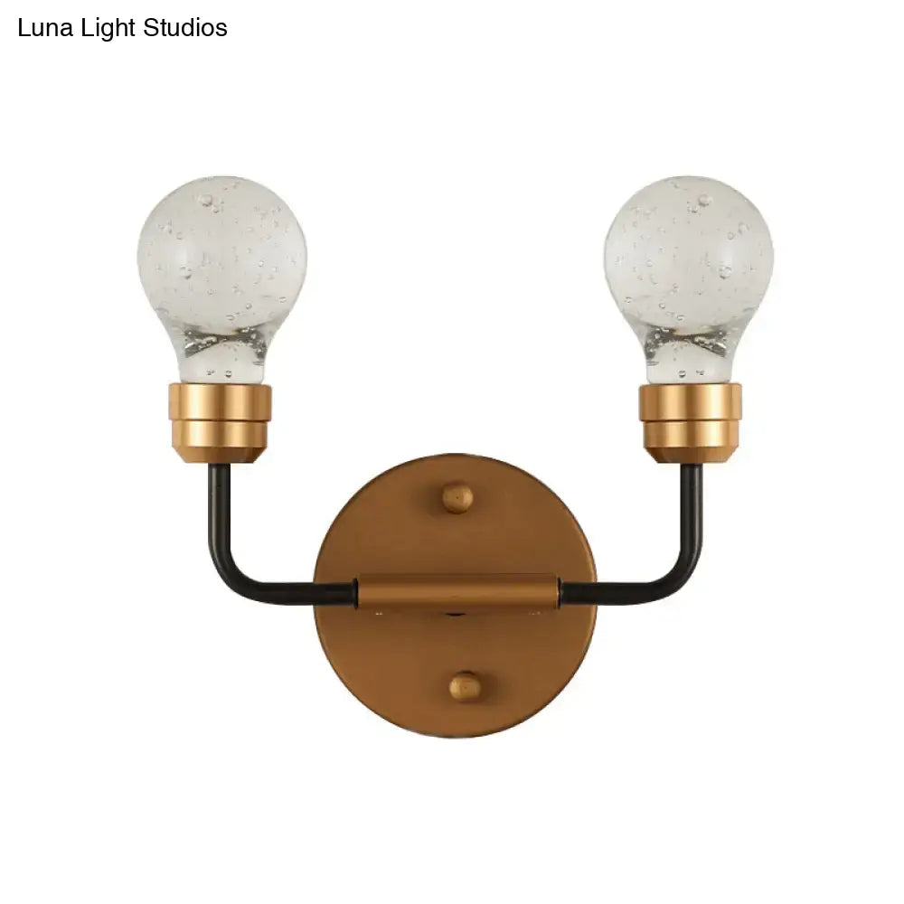Modern brass and black wall light with two seeded glass bulbs bulb shaped sconce lamp for bedroom use