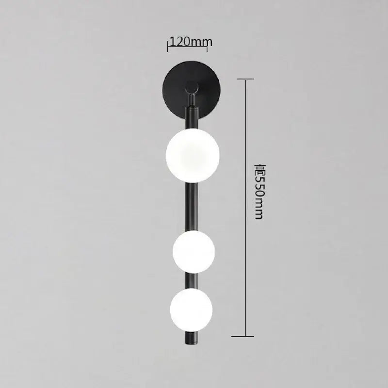 Modern brass and black frosted glass wall lamp with three globe lights perfect as a wall lamp or decorbites elegant mirror headlight