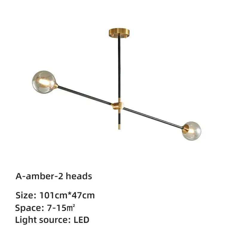 Modern brass and black geometric glass ball chandelier with amber glass globes featuring decorbites geometric glass design