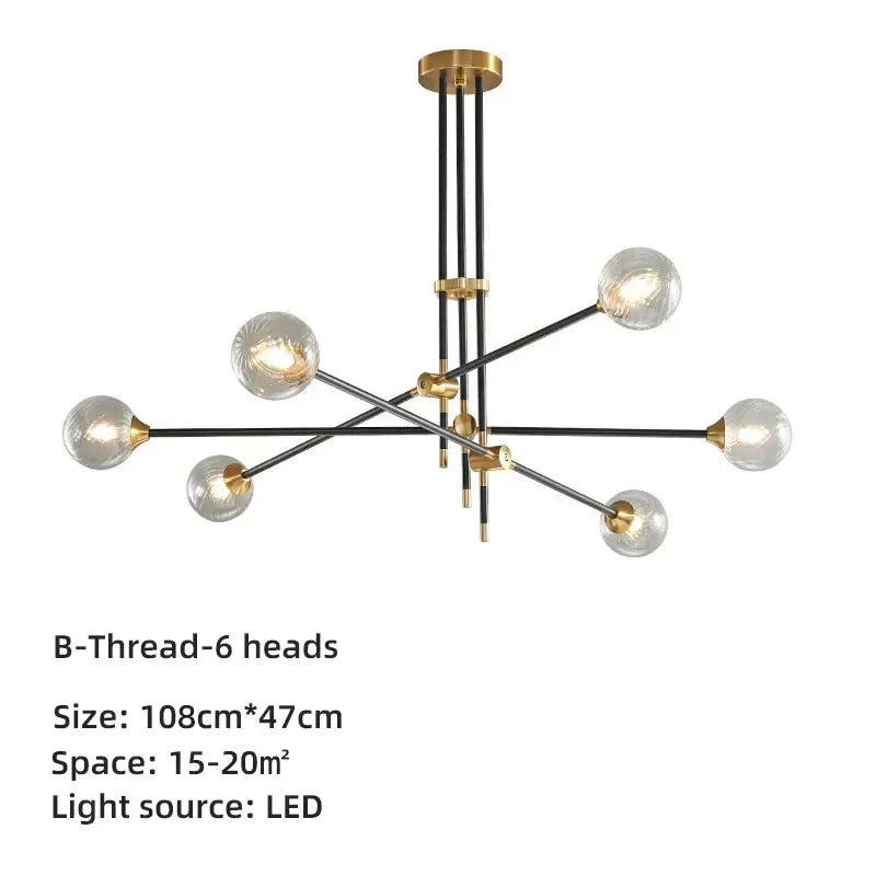 Modern brass and black geometric glass ball chandelier featuring six clear glass globe bulbs with gold accents for dining room decorbites geometric glass chandelier