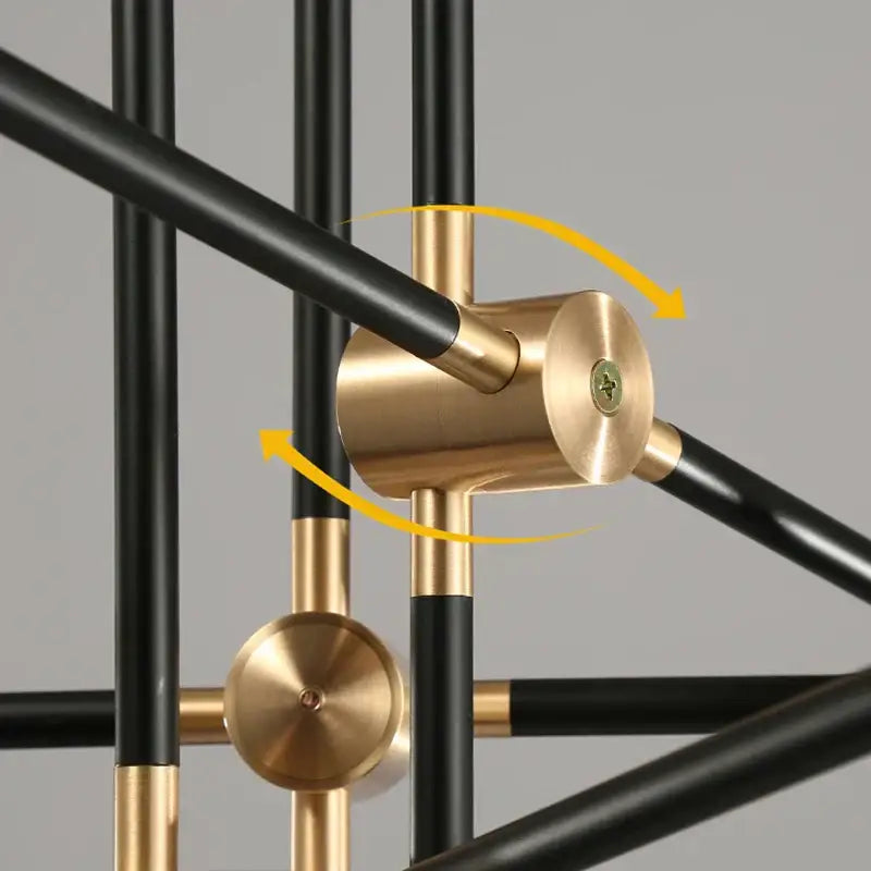 Modern brass and black geometric glass ball chandelier with intersecting metal rods and polished brass joints for dining room decorbites geometric glass