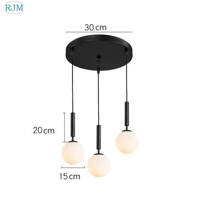 Modern brass and black glass ball led pendant light with three frosted glass globe bulbs for dining room decorbites pendant light