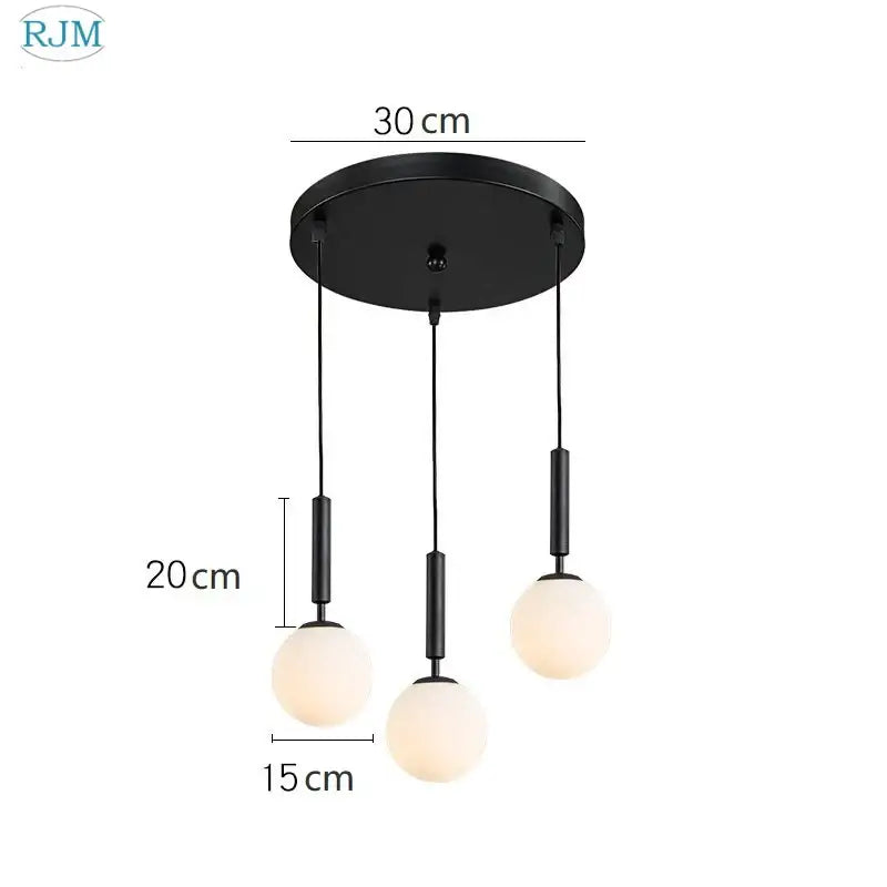 Modern brass and black glass ball led pendant light with three frosted glass globe bulbs for dining room decorbites pendant light