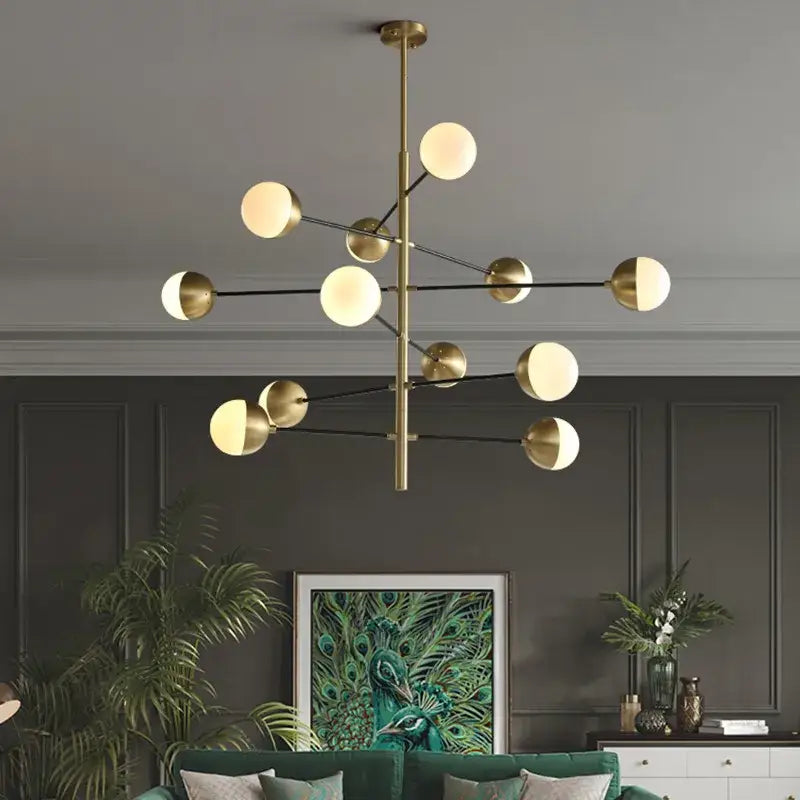 Modern brass and black glass bubble chandelier with spherical glass shades in a geometric branching design decorbites glass bubble