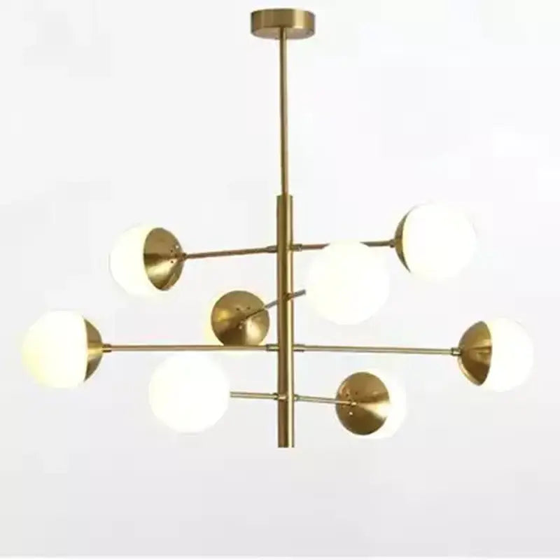 Modern brass and black glass bubble chandelier with nine frosted glass globes in a radial pattern for dining room decorbites glass bubble
