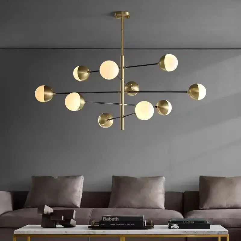 Modern brass and black glass bubble chandelier with spherical globes ideal for dining room lighting decorbites glass bubble
