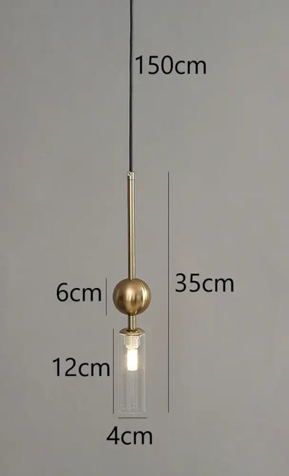 Modern brass and black glass pendant light with cylindrical shade and led bulb suspended by a cord pendant