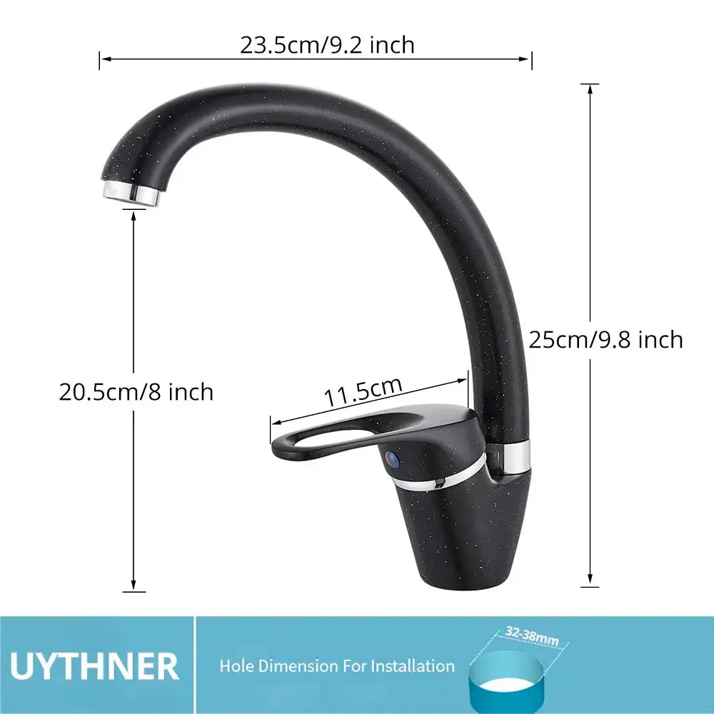 Modern brass black kitchen sink faucet with black speckled finish chrome accents and a sleek curved swivel spout decorbites brass black