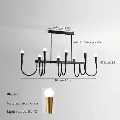 Modern brass black pendant chandelier with black iron frame glass globe bulbs and gold-toned accents for kitchen island lighting decorbites black pendant
