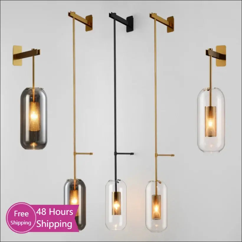 Modern brass and black wall sconce lights with slender metal arms and clear and smoky glass shades for bedroom use