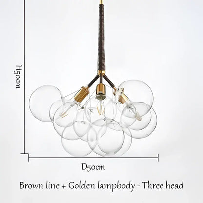 Modern brass bubble chandelier with glass bubbles brown fabric cord and golden metal accents for bedroom lighting decorbites bubble chandelier