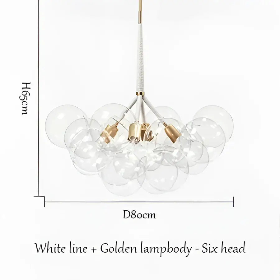 Modern brass bubble chandelier with six clear glass spheres and white lampbody accented by golden fixtures for bedroom decorbites bubble chandelier